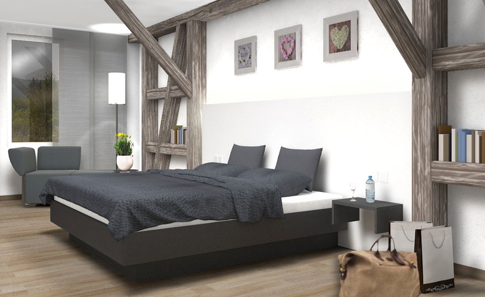 Beispiel-Pension Bild vom Schlafzimmer mit großem Kingsize-Bett.
